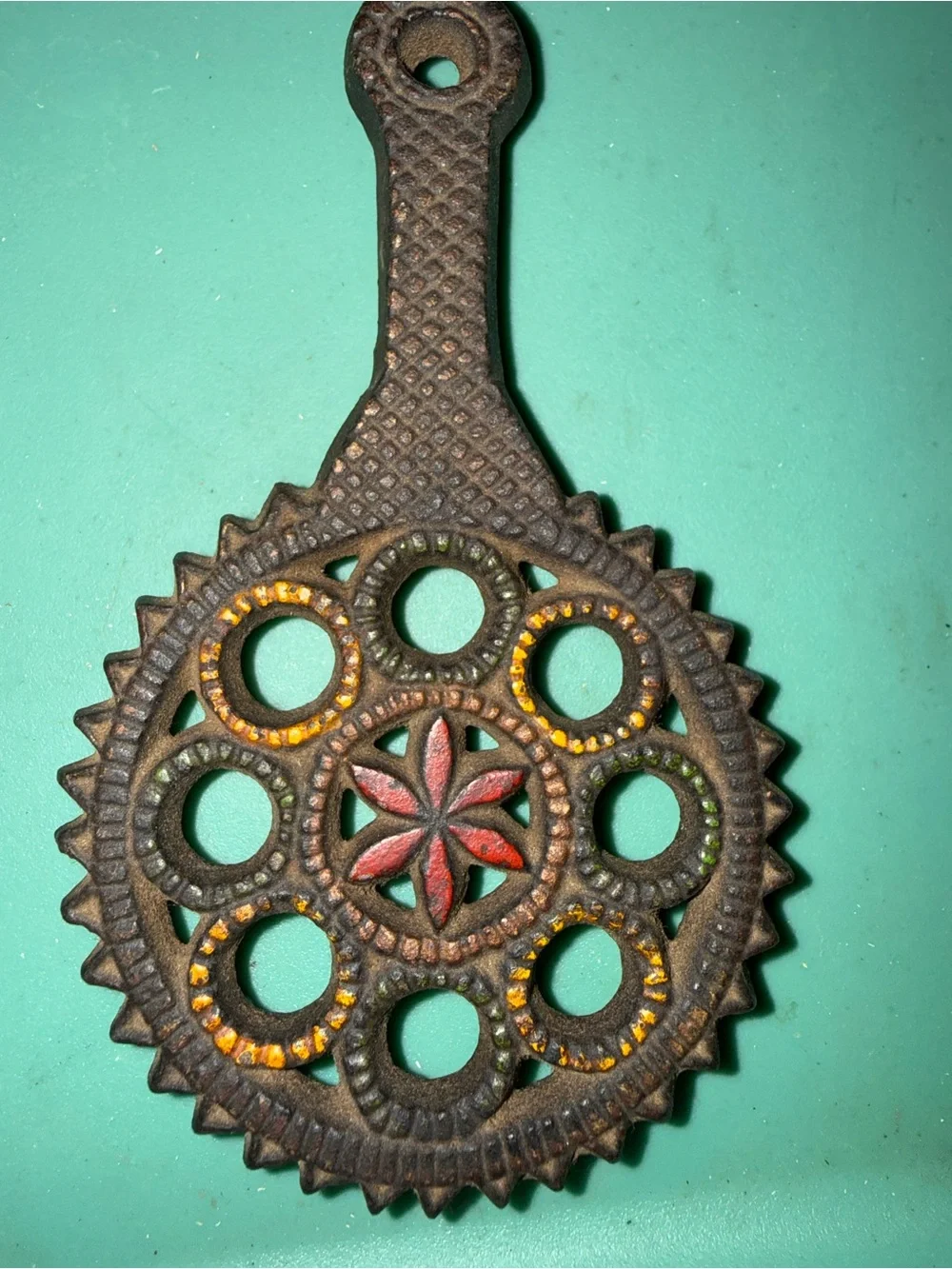 Decorative Cast Iron Trivet with Red Star Accent for Tabletop